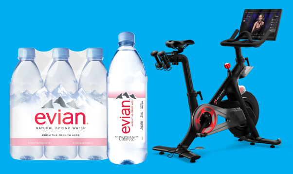Image of Evian brand bottled water and a Peleton stationary exercise bike